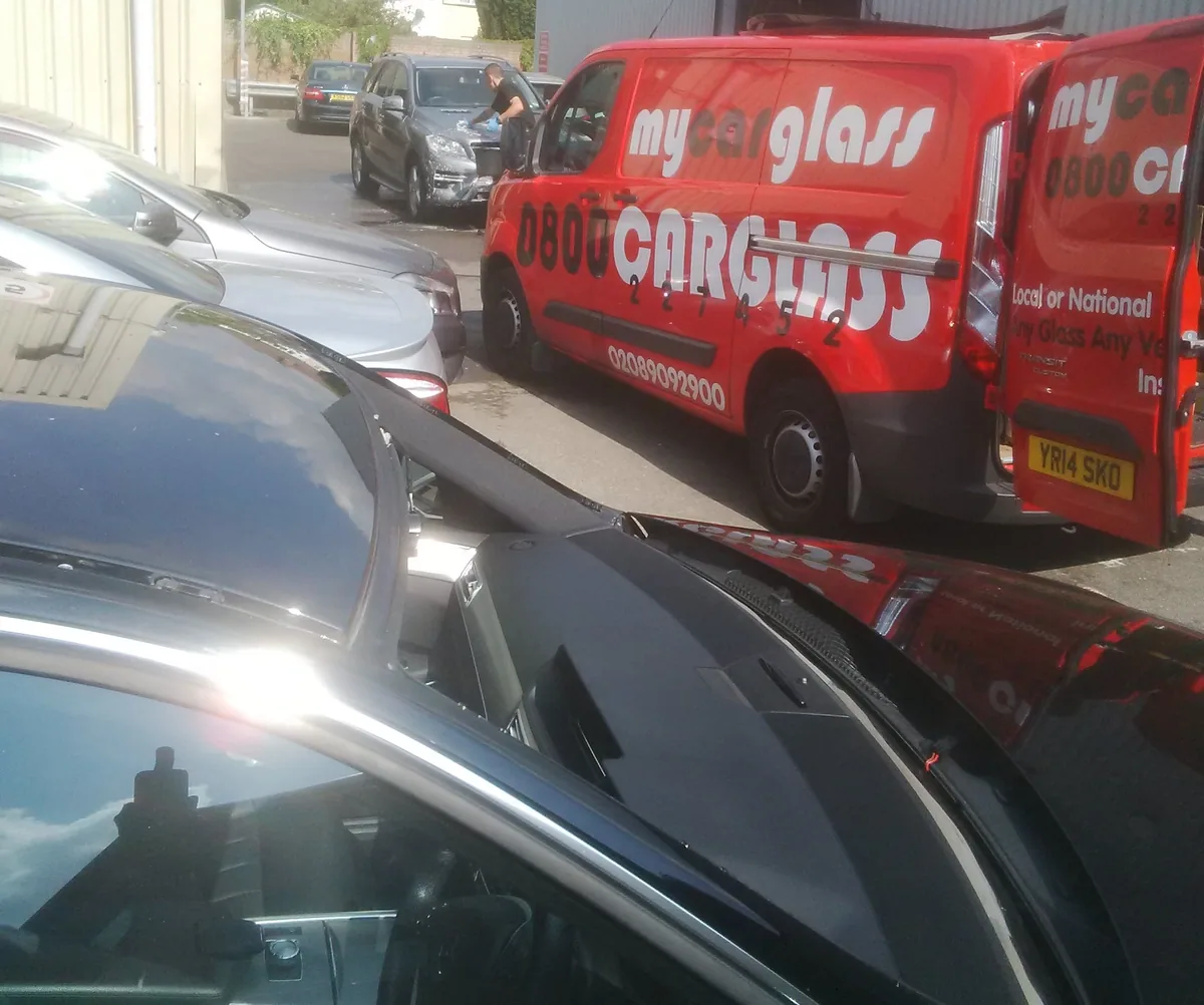 Audi estate side view after windscreen replacement.