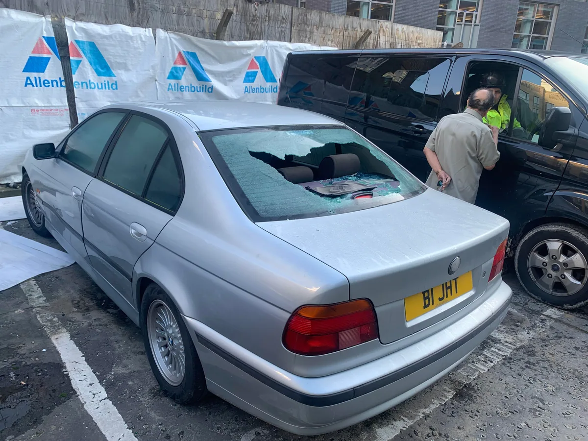 BMW saloon heated rear window replacement, alternate angle.
