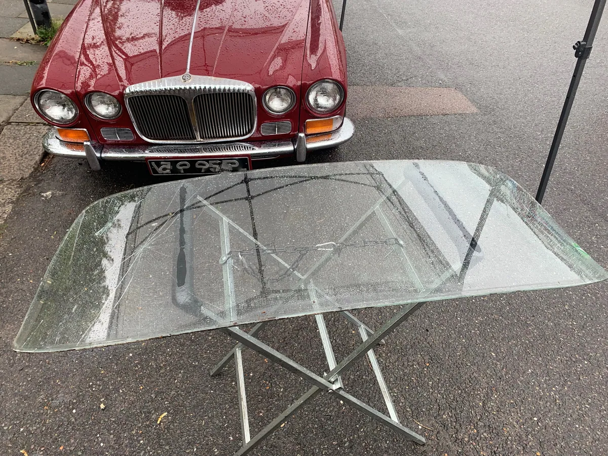 Classic Jaguar XJ6 in the workshop for windscreen replacement.