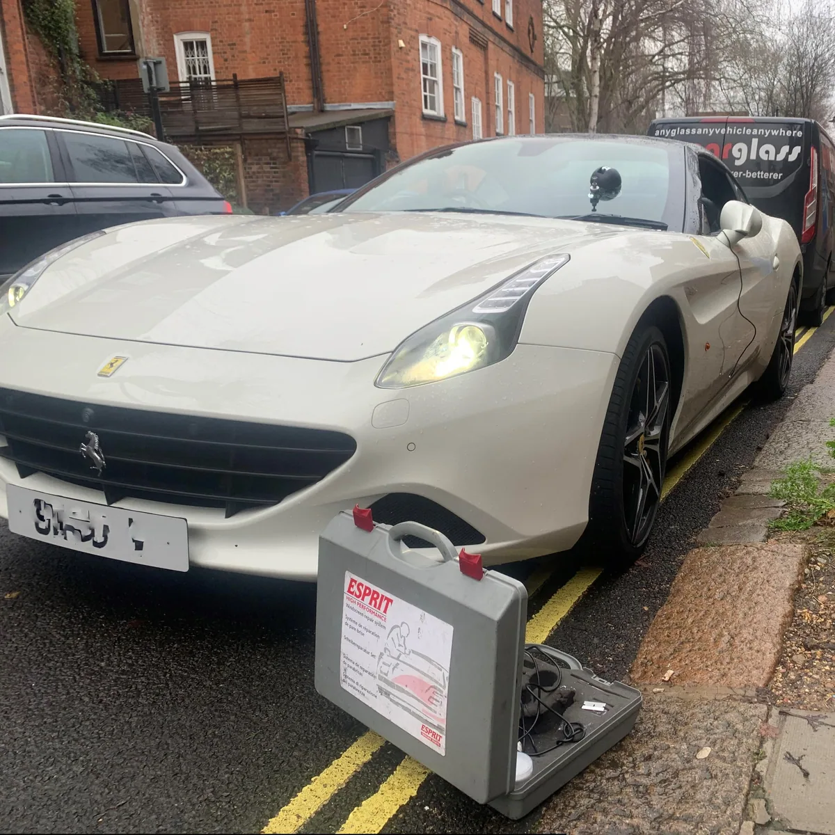 Ferrari California convertible with the replacement windscreen fitted.