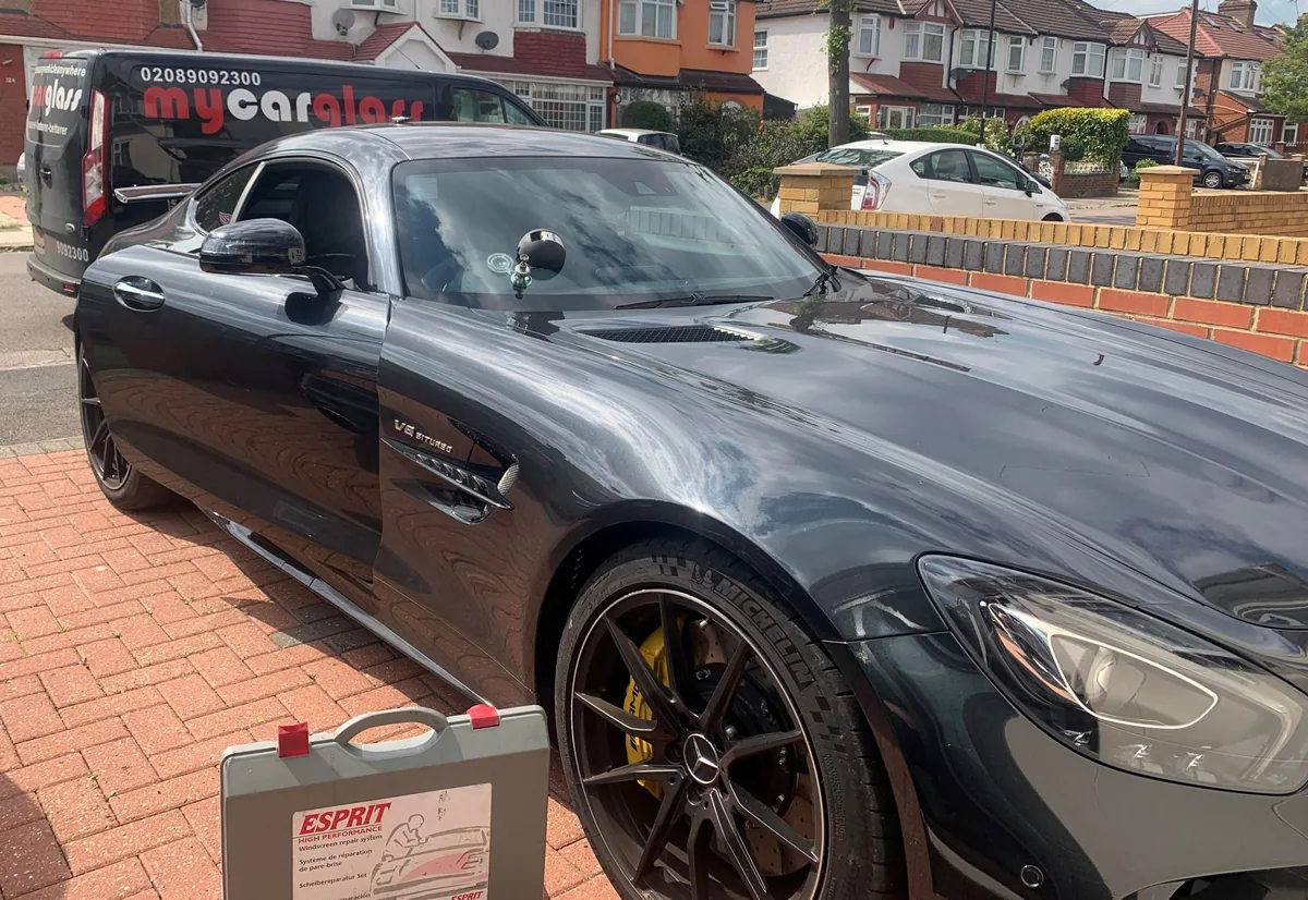 Mercedes-AMG GT with the windscreen in the process of being replaced.