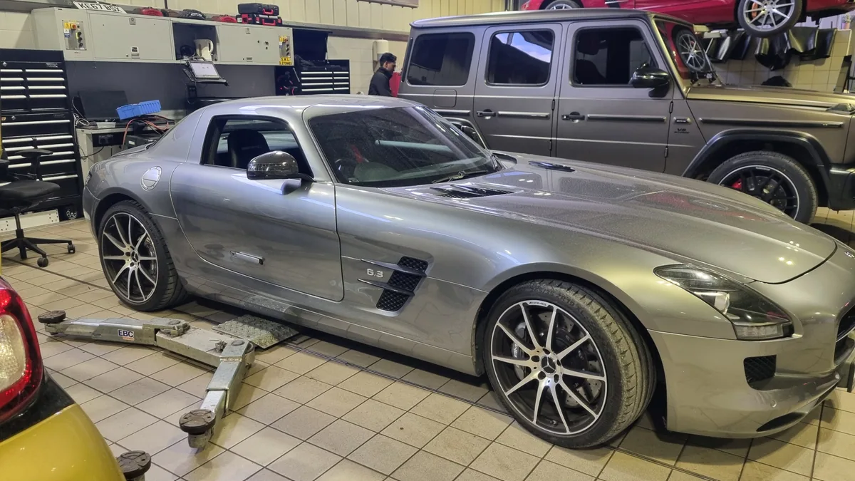 Mercedes-Benz SLS AMG Gullwing in the workshop for windscreen work.