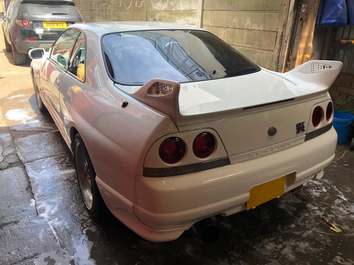 Classic Nissan Skyline with heated rear screen replaced.