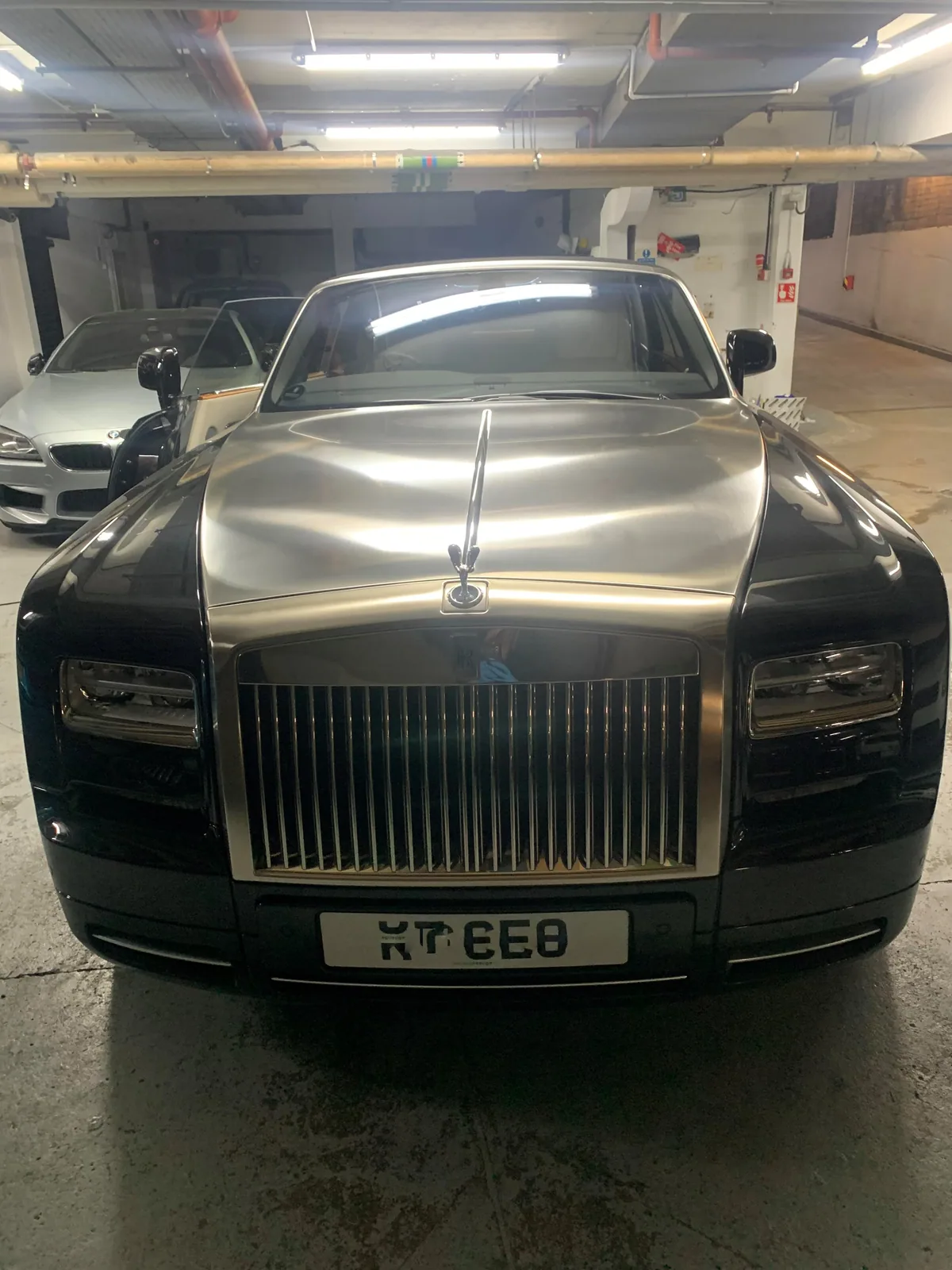 Rolls-Royce Phantom Drophead Coupé parked in the workshop for door glass replacement.