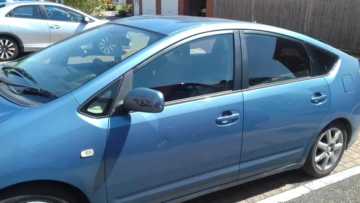 Toyota Prius during door glass replacement.